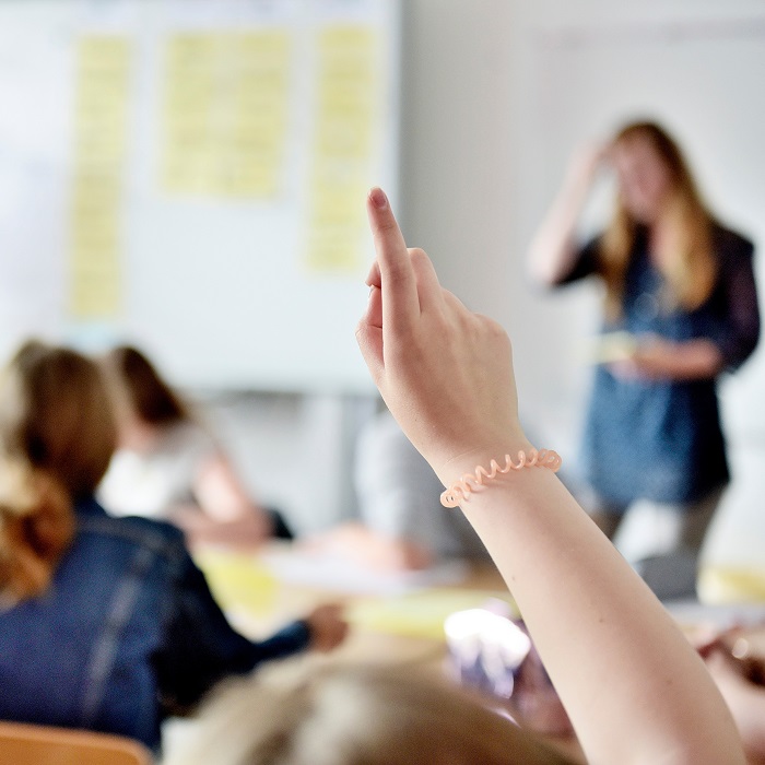 classroom student hand raised 